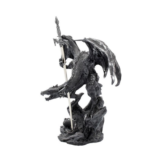 A black dragon figurine holds a sword, standing on a rocky base against a white background.