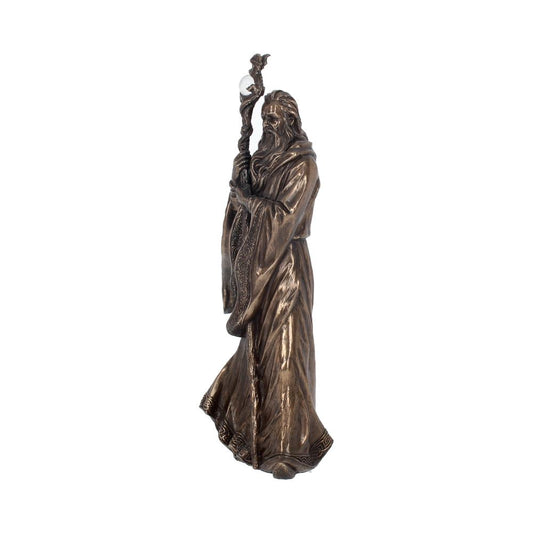 A bronze-toned wizard figurine holds a twisted staff with a crystal orb, standing in an ornate robe against a plain white background.