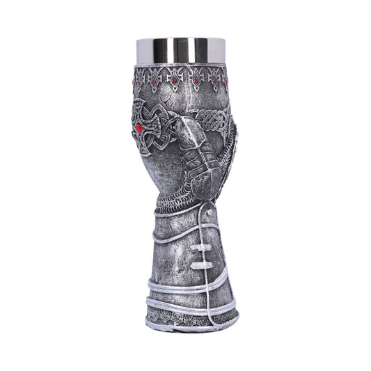 A decorative chalice resembles a gauntlet, adorned with red gems, is placed against a stark white background.