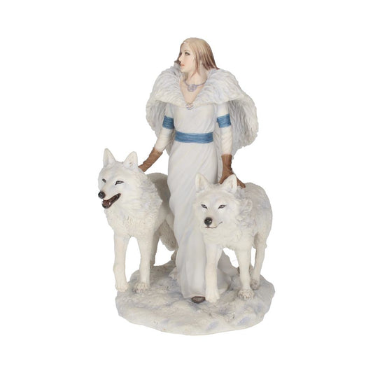 A figurine of a woman with long hair and a fur cape stands holding two white wolves on a snowy base, evoking a wintery, mystical scene.