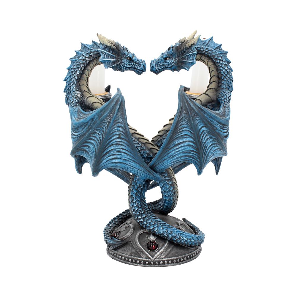 Two blue, scaled dragons curve towards each other, wings outspread, holding candles. They are perched on a gray circular base with red gems against a white background.