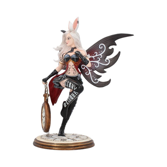 A winged fairy figurine poses with a pocket watch on a clock-themed base, featuring intricate designs and long white hair.