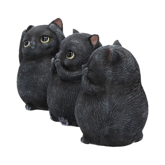 Three black cat figurines depict "see no evil, hear no evil, speak no evil," each covering its eyes, ears, or mouth, against a plain white background.