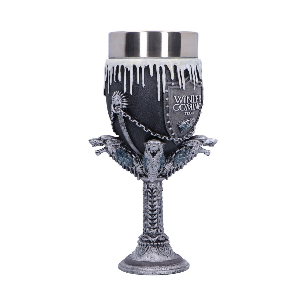 Ornate metal goblet stands on a carved stem, featuring three wolf heads and an icicle rim; shield on cup reads "WINTER IS COMING STARK" against a plain white background.