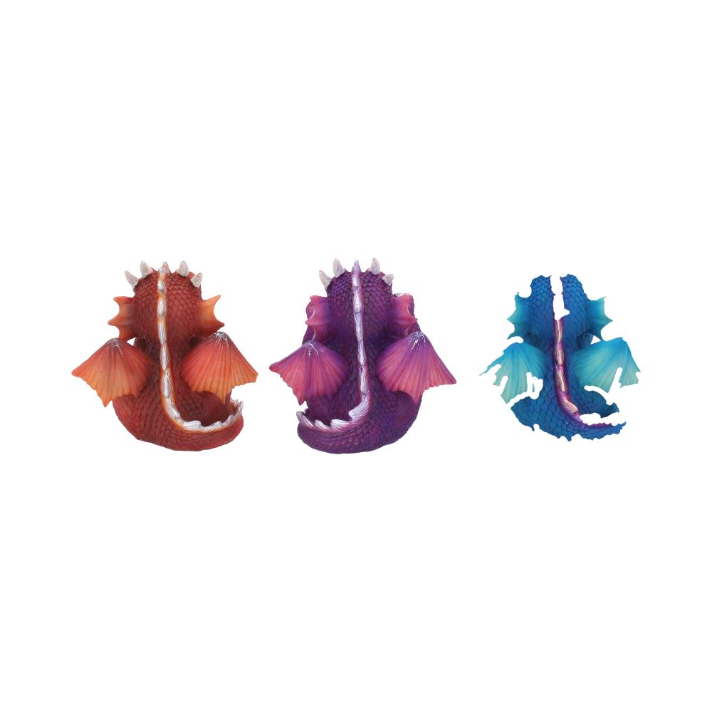 Three colorful dragon figurines sit together, each showcasing vibrant scales and wings in hues of red, purple, and blue. They face away on a plain white background.