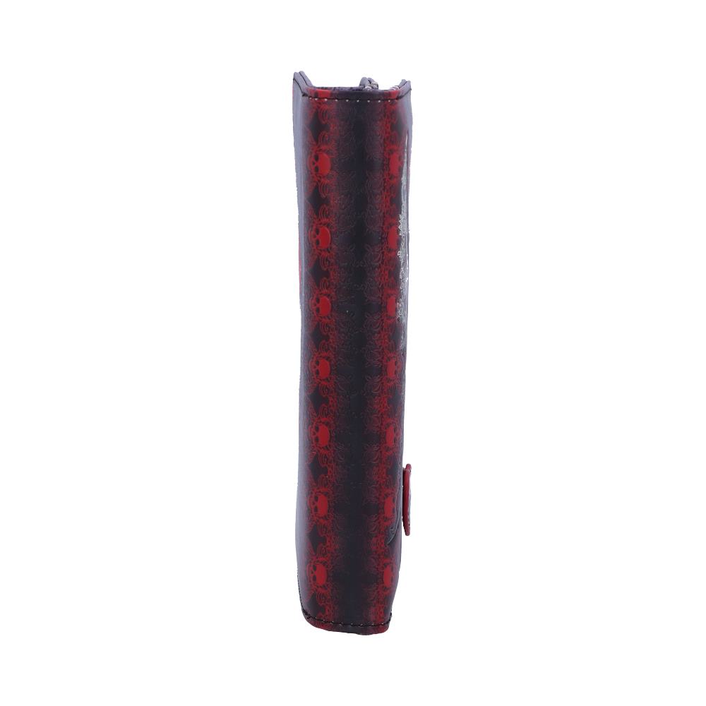 A red and black skull-patterned wallet stands upright against a white background.