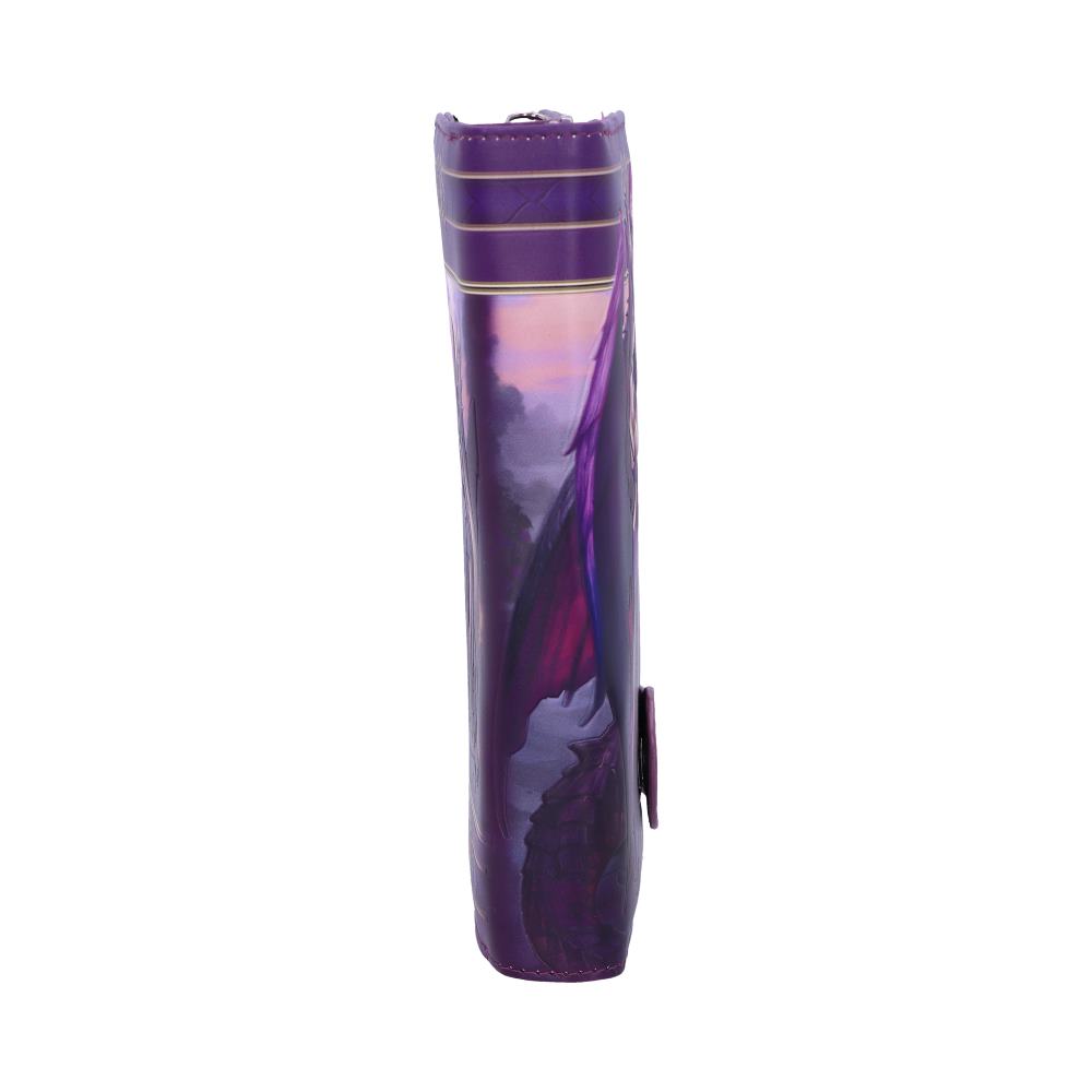 A purple wallet stands upright, showcasing a dragon-themed design against a sunset backdrop.