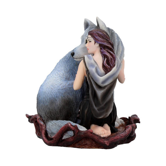 A woman with long hair, wearing a cloak, sits and embraces a large wolf, both placed on a textured, tree-like base. Their serene pose suggests a calm, protective bond.