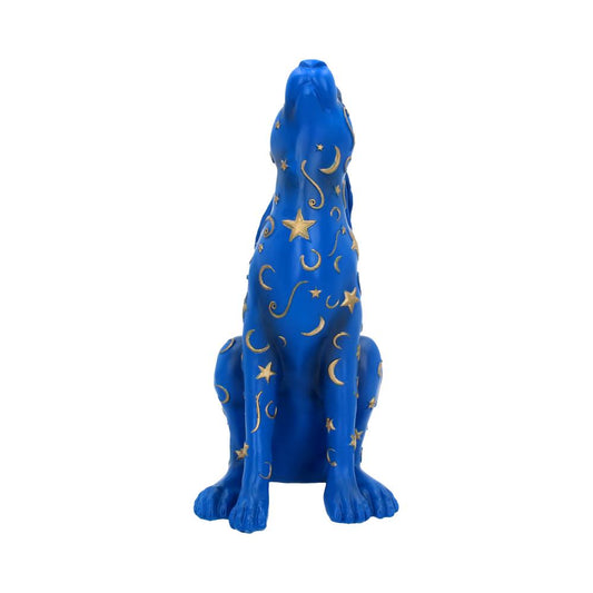 A blue dog statue sits upright, adorned with gold stars and crescent moons, against a plain white background.