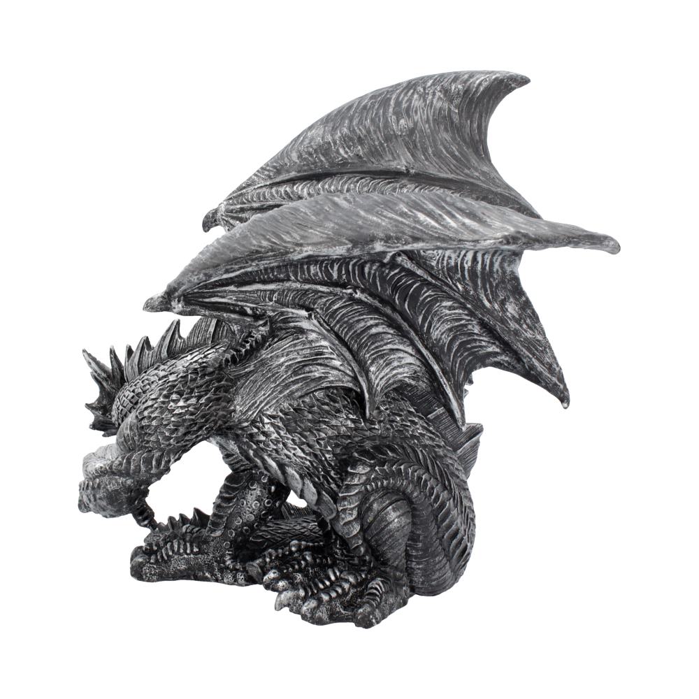 A detailed dragon sculpture crouches with wings folded and head resting on its claws. It appears metallic, exhibiting intricate scales and textures. The background is plain white, emphasizing the dragon.