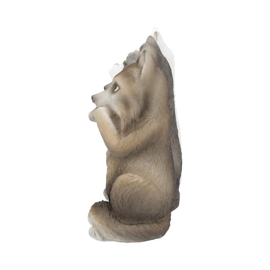 A raccoon figurine sits upright, appearing to play with its paws. It's set against a plain white background, highlighting its realistic fur texture and curious expression.