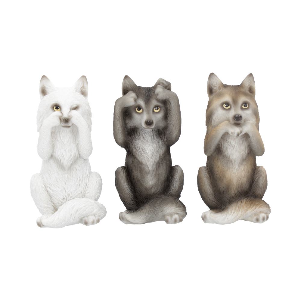 Three wolf figurines depict the "see no evil, hear no evil, speak no evil" concept. The white wolf covers eyes, the gray wolf covers ears, and the brown wolf covers mouth, against a plain backdrop.