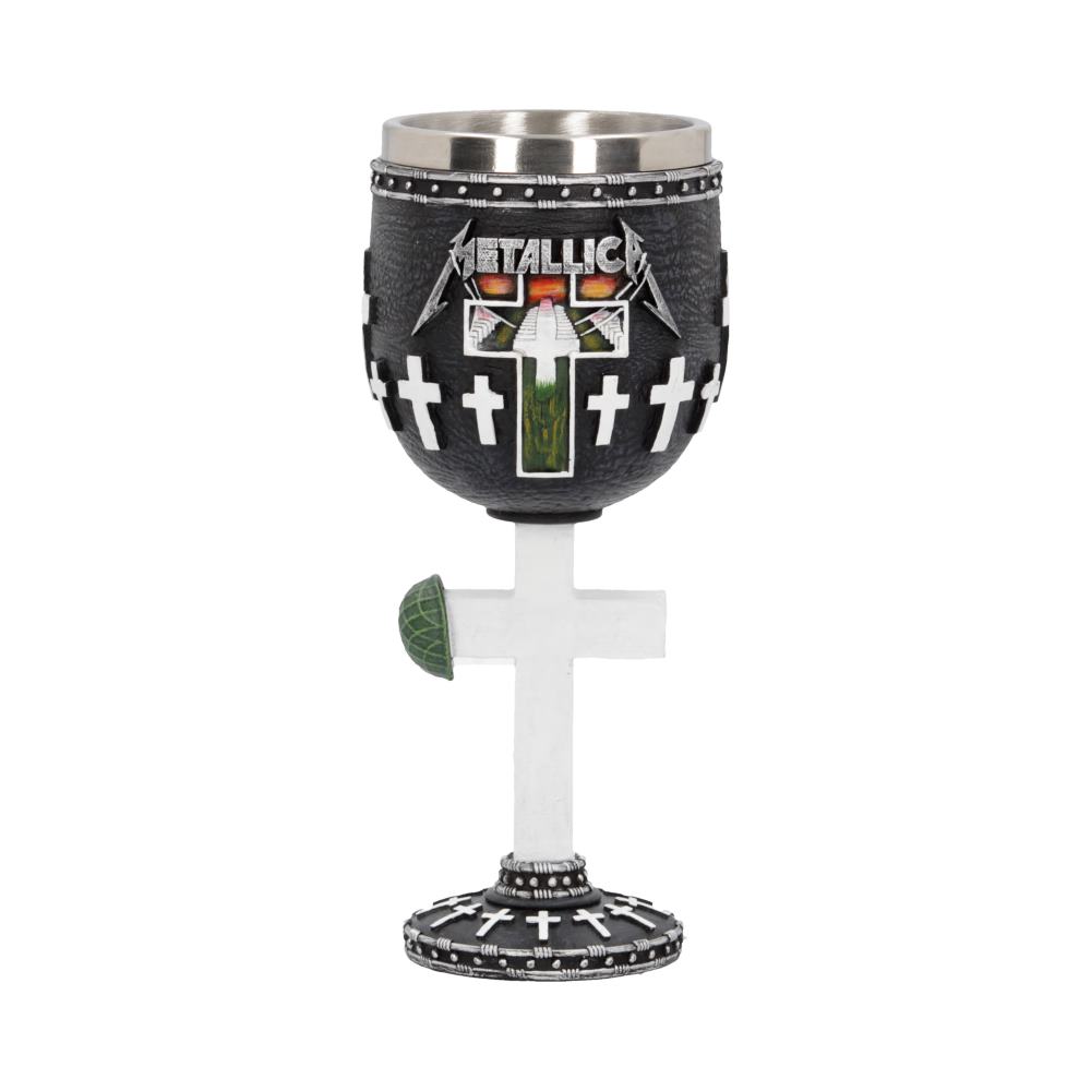 A black goblet features raised white crosses on its surface with green interior. "METALLICA" text appears above a cross design. The stem resembles a cross with a helmet detail.