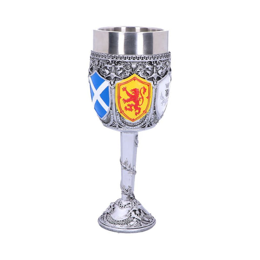 A metal goblet with coat-of-arms imagery sits on a white background. The cup's shields have various designs, including a blue and white X, and a red lion on a yellow field.