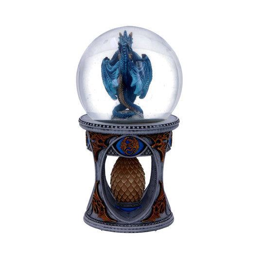 A blue dragon figurine sits inside a glass sphere atop an ornate stand; the stand features a dragon egg.