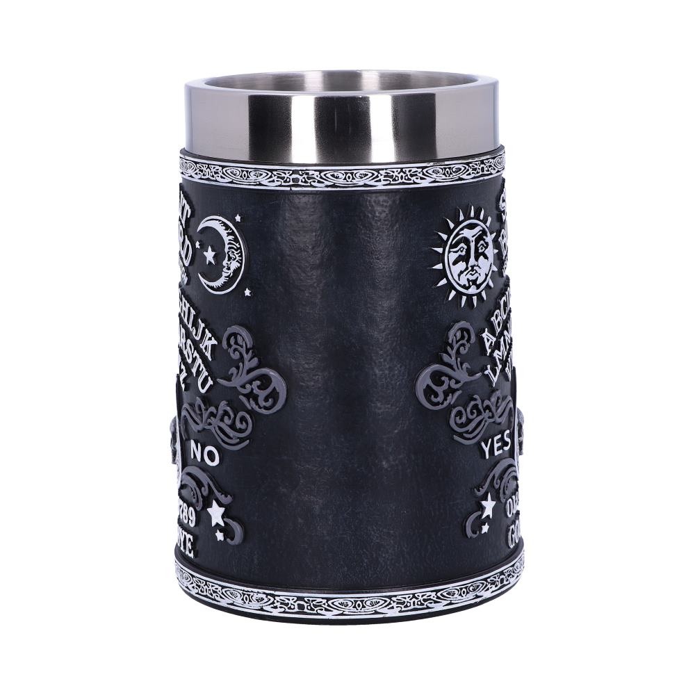 The dark cylinder has a silver rim and base, decorated with a ouija-inspired design including letters, numbers, and the words "YES" and "NO," along with a moon and sun.
