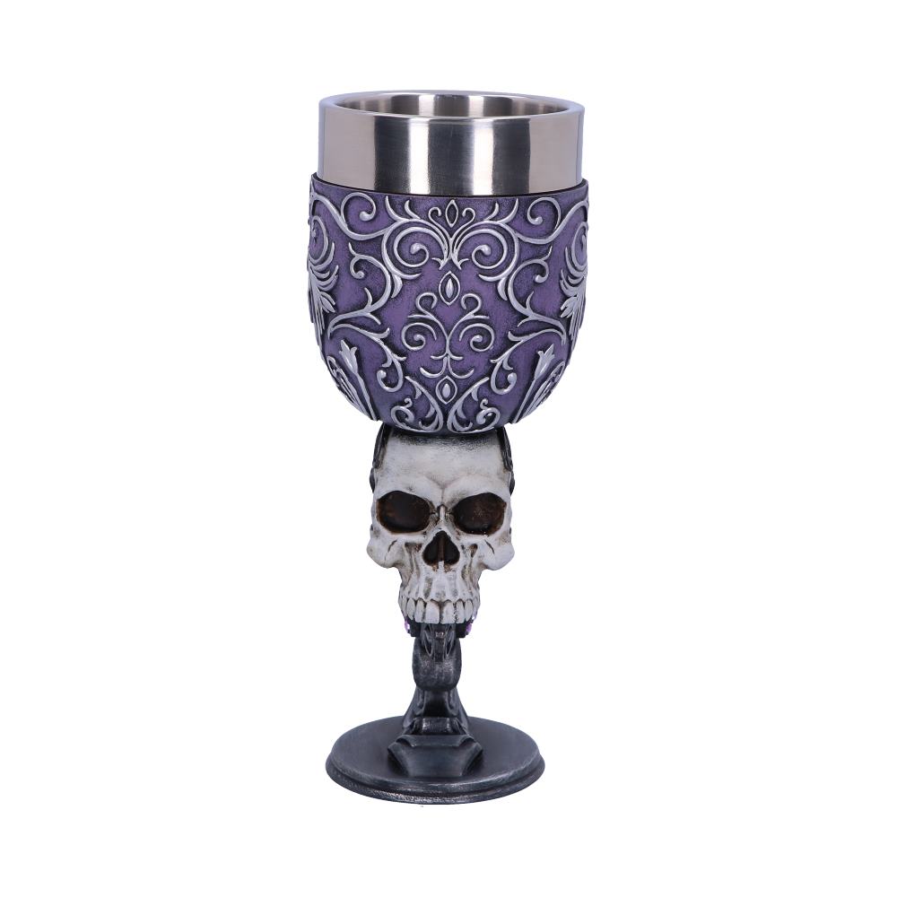 A goblet with a stainless steel rim features an ornate purple cup, supported by a detailed skull-shaped stem on a black pedestal base, set against a plain white background.