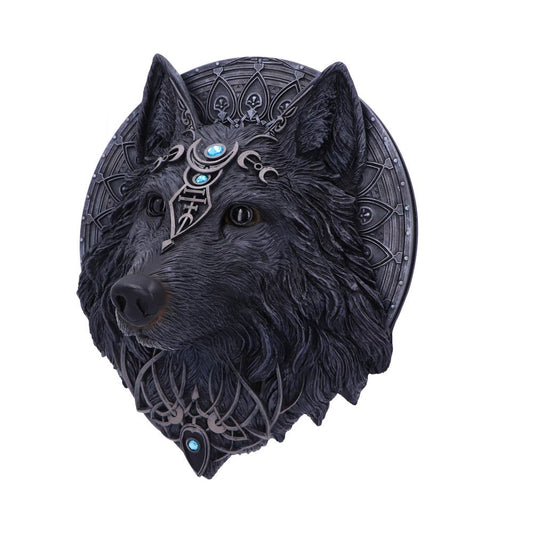 A gray wolf sculpture adorned with intricate silver and blue gemstone headgear rests against a detailed circular, ornamental background, displaying an elegant, mystical appearance.