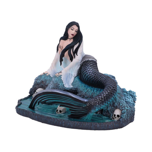 A mermaid rests on a rocky outcropping surrounded by water and skulls. The figure wears a white flowing shirt and has a black scaly tail.