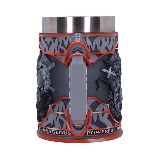A detailed mug with futuristic designs and red accents, featuring raised sci-fi elements and characters, stands upright. The text around the base reads, "COURAGEOUS POWERFUL O."