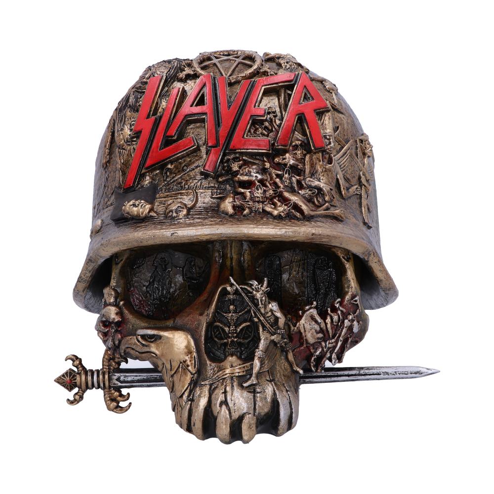 A skull-shaped helmet features intricate carvings and a sword crossing through its mouth. The red text "SLAYER" is prominently displayed on it, surrounded by detailed battle scenes.