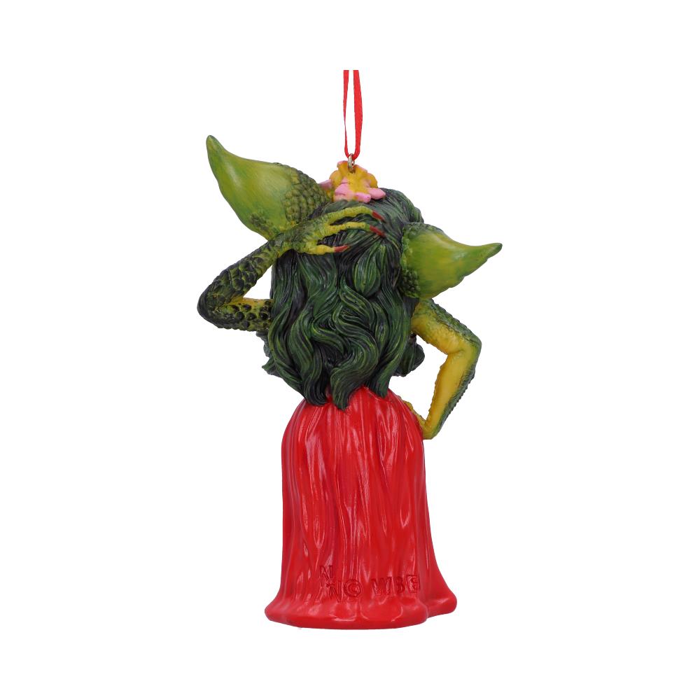 A green creature with spiky ears, wearing a red dress, holds its head. It hangs from a red string in a plain white background. The base reads "NO WHINE."