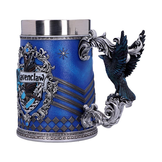 A detailed, decorative mug features a blue and silver theme, with the "Ravenclaw" crest and an elaborate handle shaped like a raven, set against a plain background.