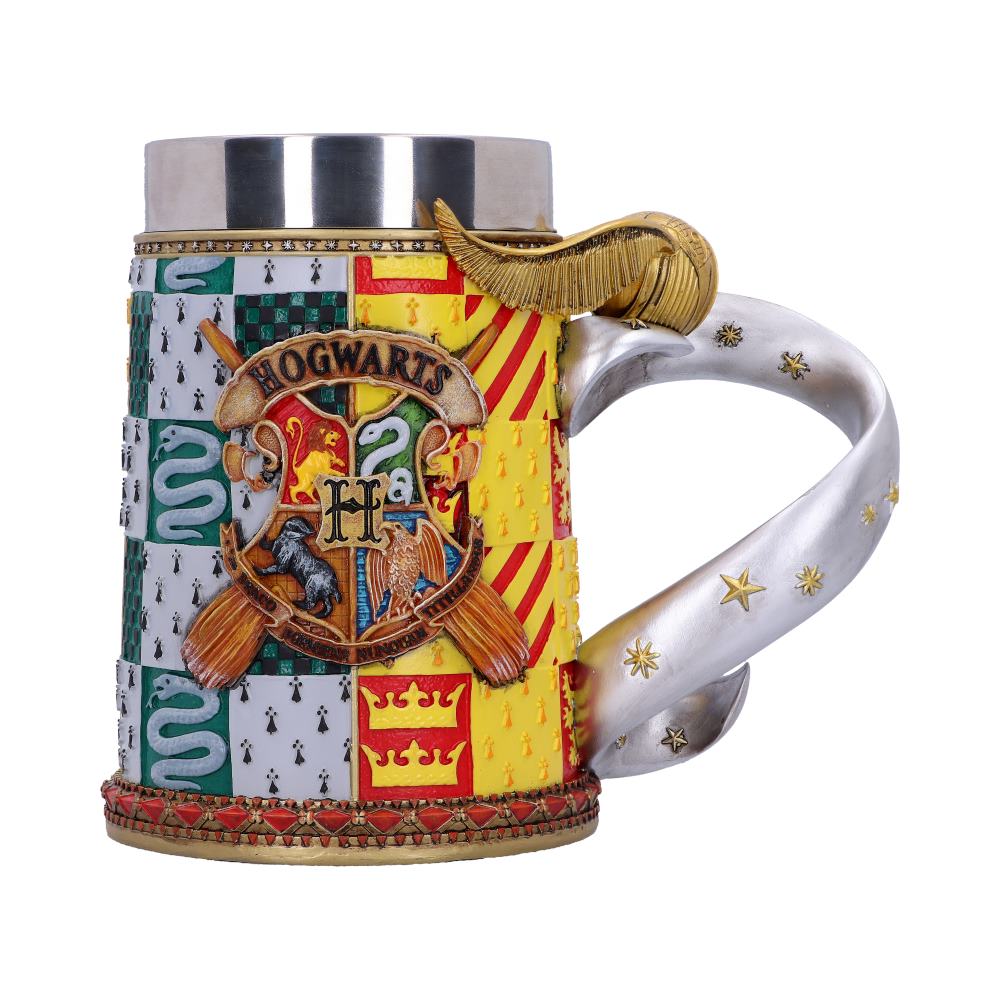 A detailed mug displays a "Hogwarts" crest with ornate house emblems. It features a twisting handle adorned with stars and a horn-like element, in a magical, multicolored design.