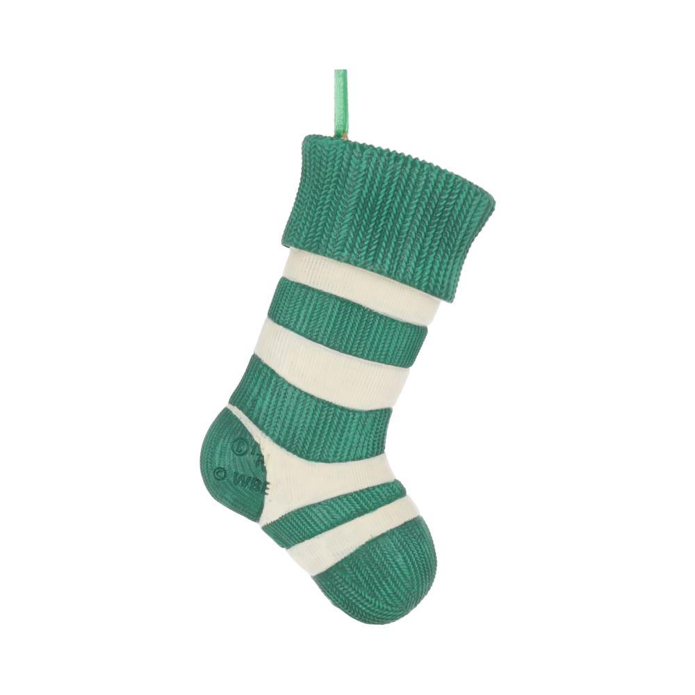 A green and white striped sock hangs with a green loop, featuring a ribbed cuff. It bears logos and the text: "© WBE." The background is plain white.