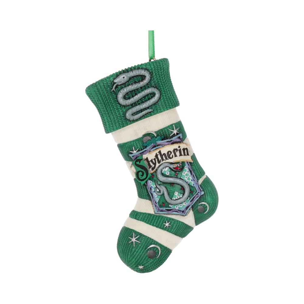 A green Christmas stocking featuring a coiled snake, the word "Slytherin" in bold letters, set in a decorative, star-filled design. Hanging by a green loop, it represents a magical theme.