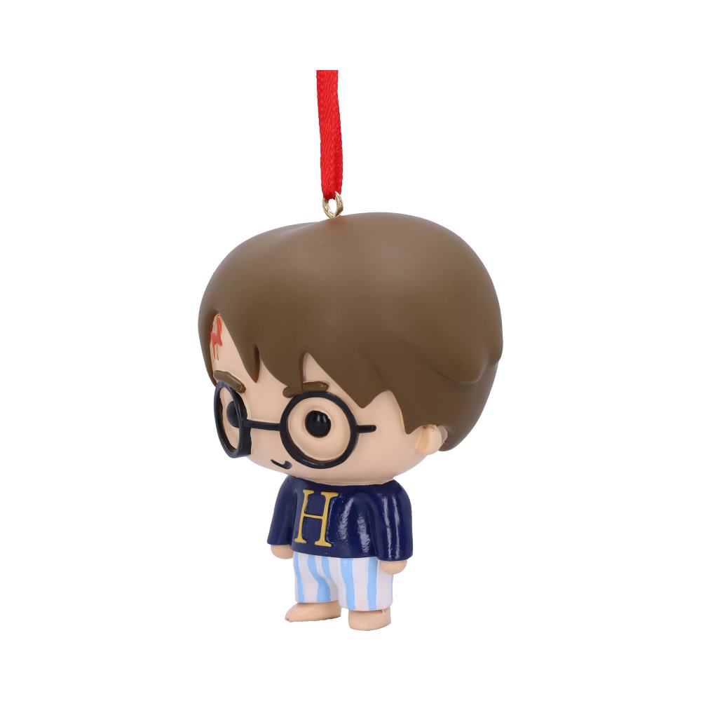 A chibi-style figurine with glasses and a lightning scar hangs from a red string. It wears a blue sweater with an "H" and striped pants, against a plain background.