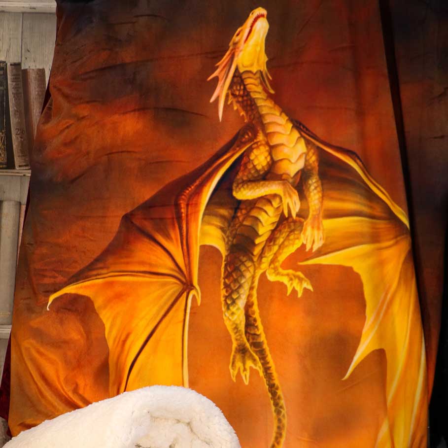 A golden dragon, ascending, is depicted on a fiery-orange textile.
