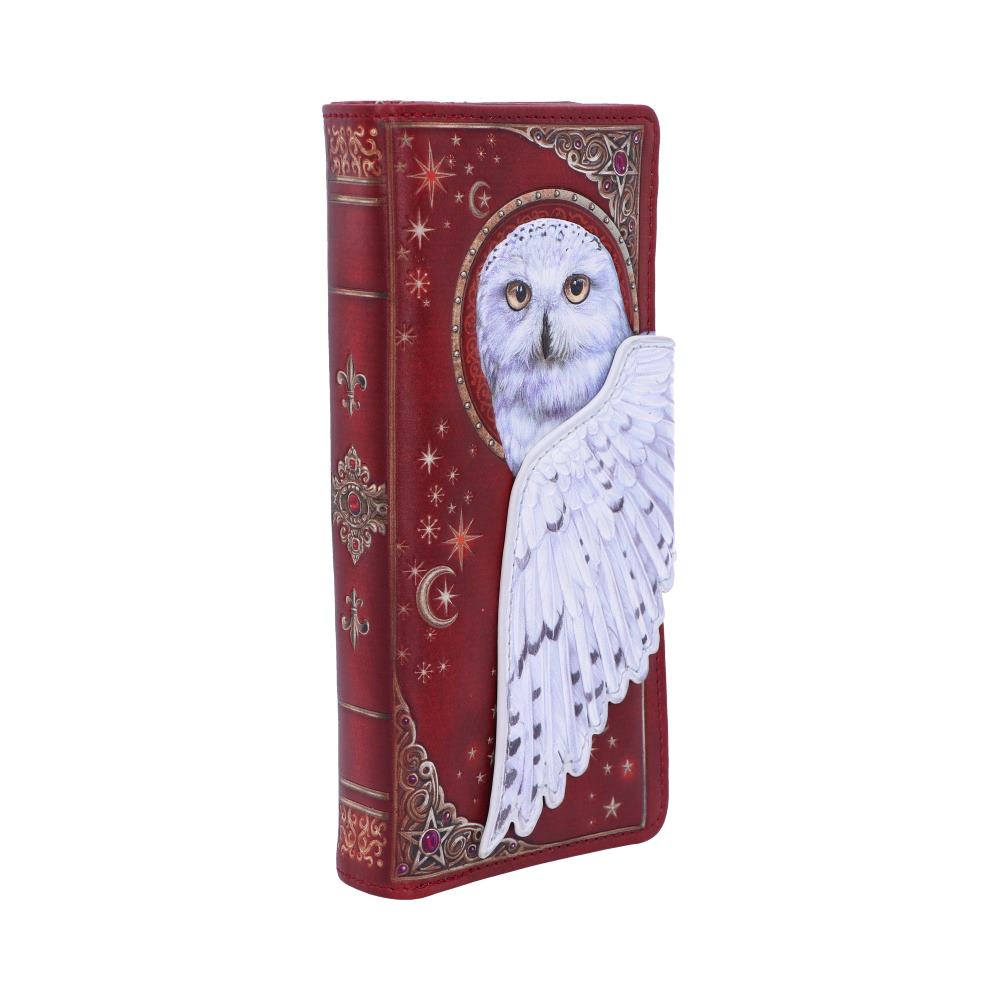 A red book-shaped wallet, featuring a snowy owl and its wing, rests on a white background.