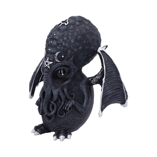A baby Cthulhu figurine stands, showing textured skin, detailed wings, tentacles, and silver highlights on the feet and wings, all against a plain white background.