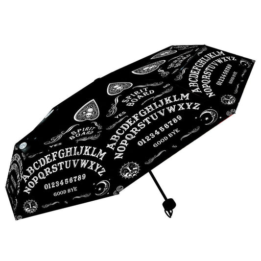 A black umbrella, featuring a Ouija board design, is shown slightly opened against a white background.