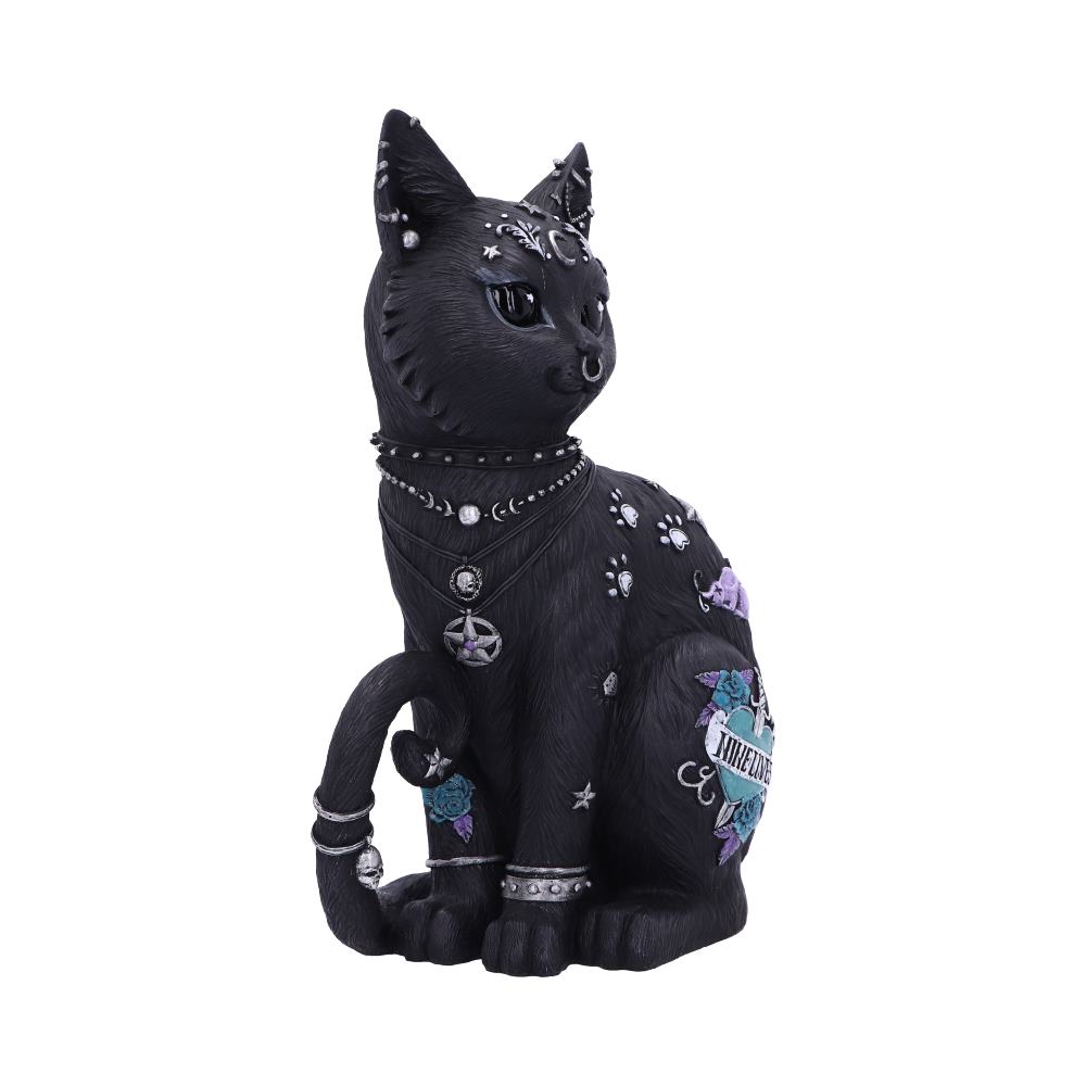 A black cat figurine adorned with flowers, jewels, and mystical symbols sits gracefully. Its body features a banner with the word "UNVEILED." The background is a plain white space.