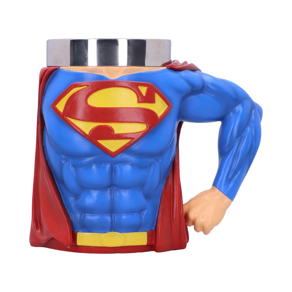 A mug resembling a superhero's torso, featuring a blue suit, red cape, and an emblem with an "S" on the chest. The handle is formed by a muscular arm.