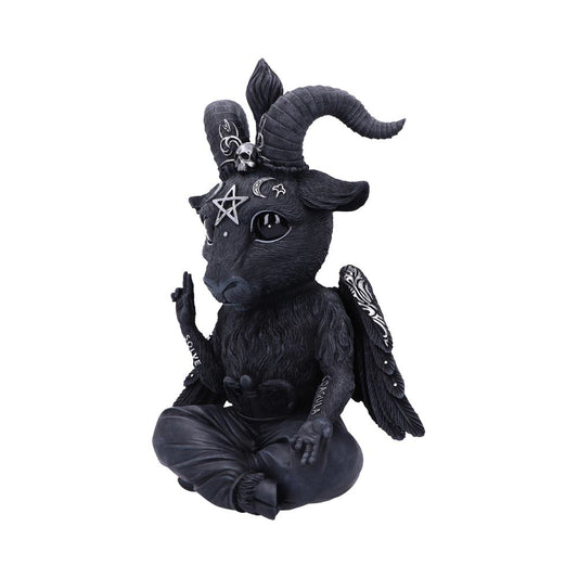 A horned, winged, black Baphomet statue sits cross-legged on a white background, with the word "SOLVE" on the raised hand and "COAGULA" on the other.