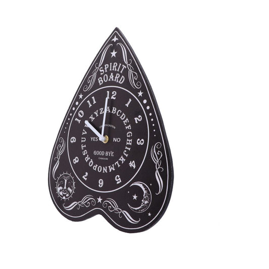 A black clock shaped like a planchette features "SPIRIT BOARD" text, numbers, the alphabet, and words "YES," "NO," "GOOD BYE," with moon and sun designs, on a white background.