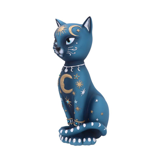 A statue of a seated blue cat adorned with golden celestial symbols like crescent moons and stars. The cat has its tail curled around its feet, set against a plain background.
