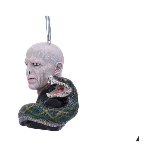 A detailed bust ornament depicts a bald, pale figure with a snake wrapped around its shoulders. The snake has an open mouth and appears predatory. It hangs from a thin string.