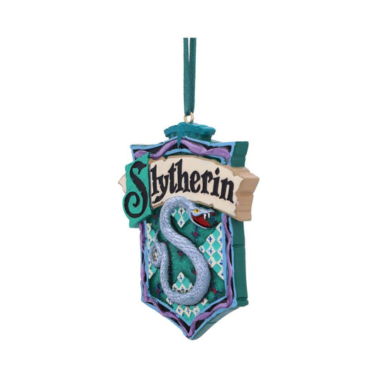 Ornament depicting a snake wrapped around a crest with text "Slytherin" in bold letters. The design is green and purple, hanging from a ribbon, isolated on a white background.