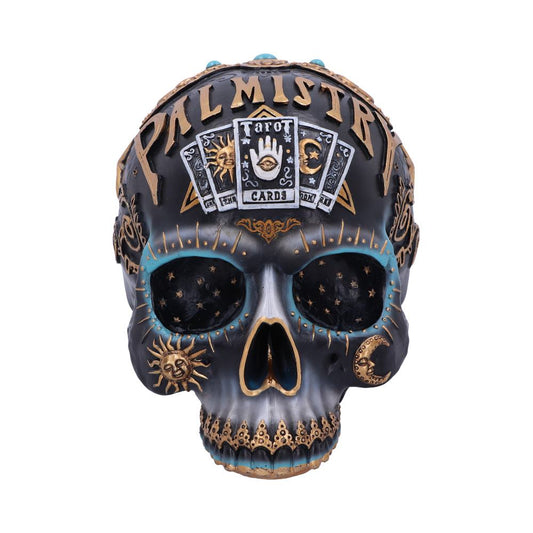 A detailed black skull decoratively features "PALMISTRY" and tarot card illustrations. Gold and turquoise accents, celestial motifs, and the word "TAROT CARDS" add mystical flair, creating an intriguing, occult-themed ornament.