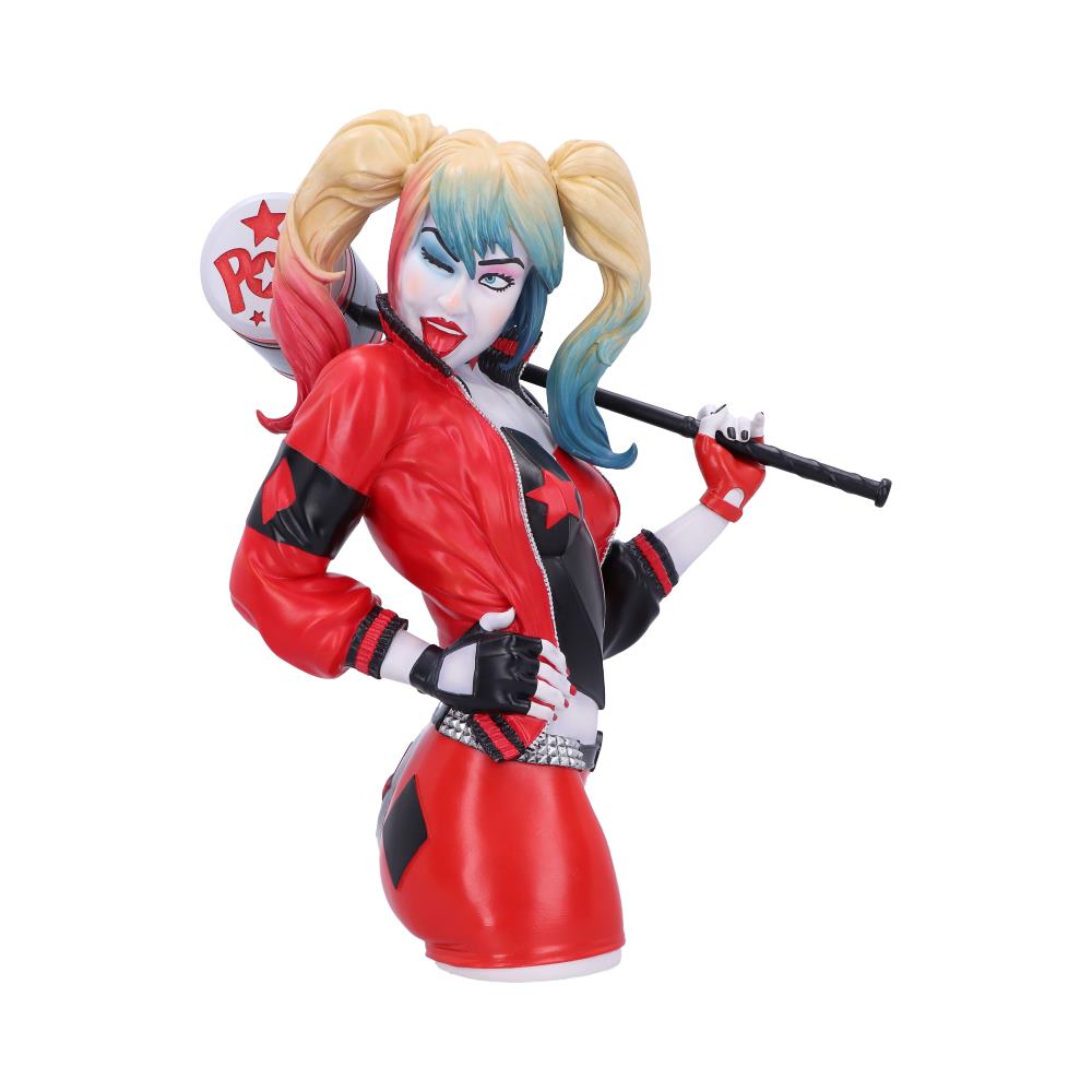 The statue portrays a colorful character with blonde and blue pigtails, playfully holding a bat. She's wearing a red and black outfit, set against a plain white background.