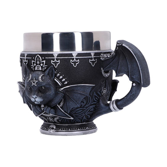 A black and silver mug with a black cat design, including wings and symbols, wraps around the front. The handle is shaped like a bat wing, all against a white background.