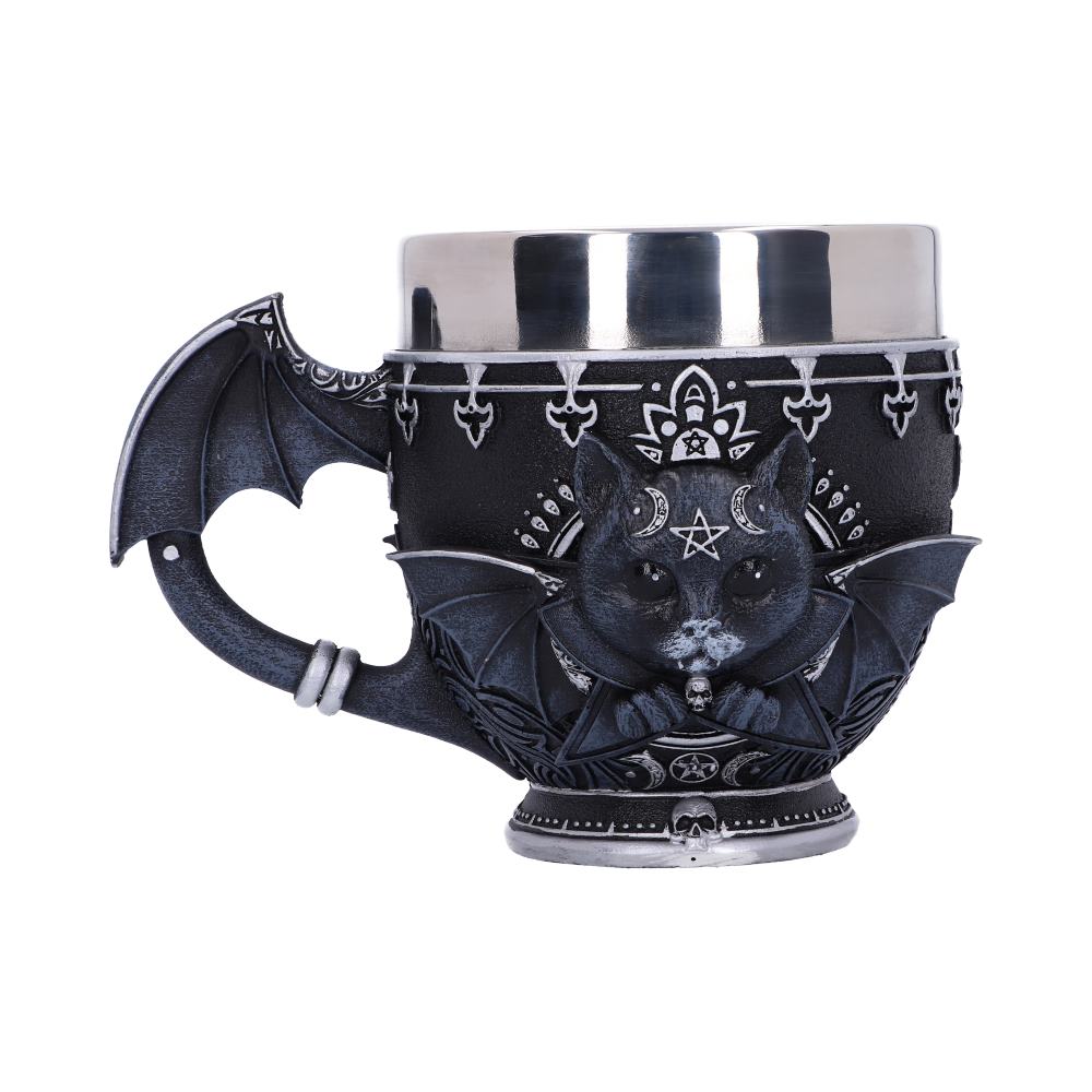The black mug features a cat's head with bat wings, adorned with gothic symbols like a crescent moon, star, and skull in a white background.