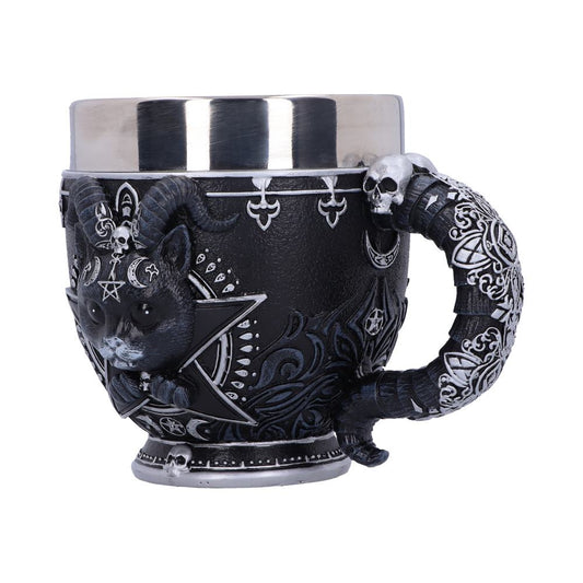 A black mug shows a relief of a horned cat against a pentagram, decorated with skulls and crescent moons. The handle is patterned, ending with a skull, all against a white background.