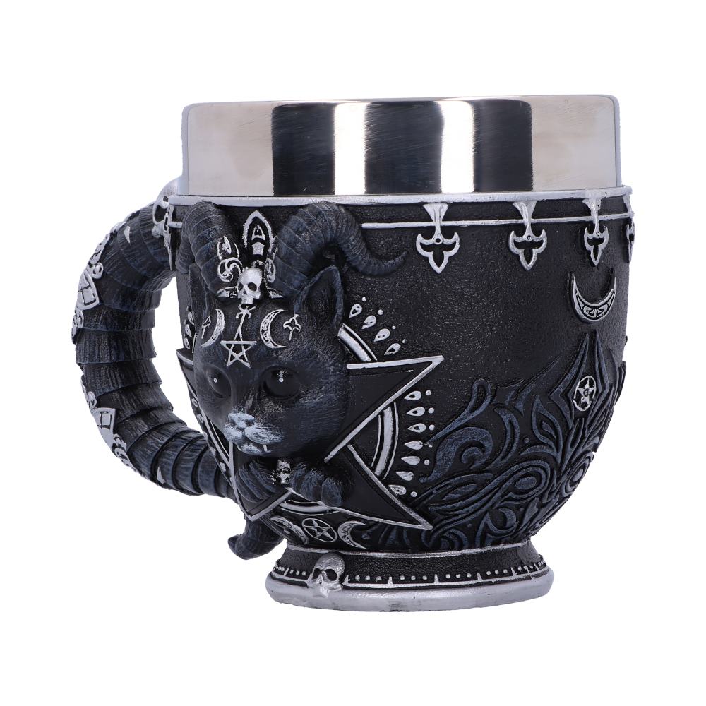A black mug features a horned cat head emerging, its paws clutching a star. Silver trim accents the top and base, and the mug is ornamented with occult symbols.