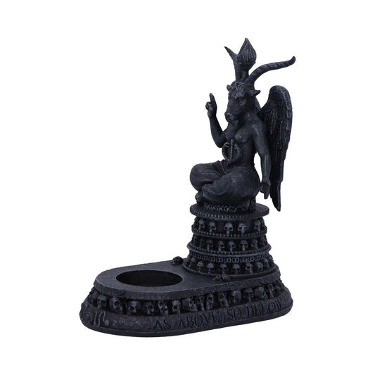 Baphomet statue sitting cross-legged, right hand pointing up and left pointing down on a skull-adorned tiered pedestal with a candle recess, dark stone against white background text on base reads AS ABOVE SO BELOW
