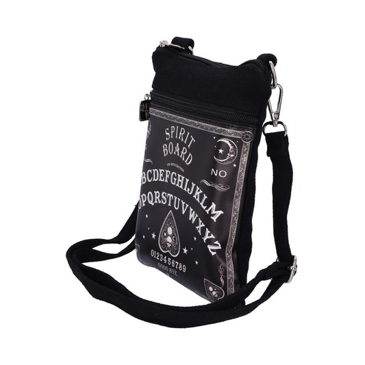 A black shoulder bag displays a "Spirit Board" design with letters "A-Z", numbers "0123456789", and words like "NO," "USE WITH CAUTION," and "GOOD BYE" against a white background.